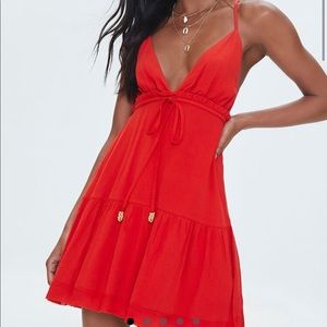 Plunging open back mini dress.